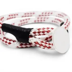 armband av röd och vit tamp med silverspänne