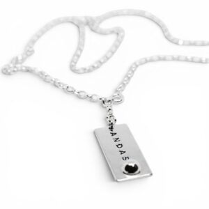 silversmycke med texten ANDAS