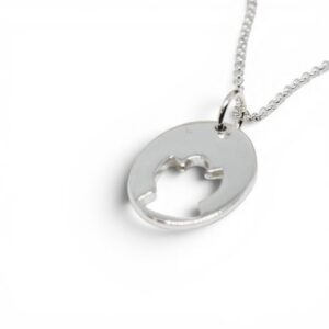 silversmycke med utskuren skyddsängel